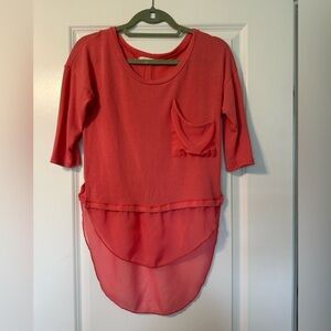 Coral Sweater Too with Sheer Detailing and Slit Back. Size small.